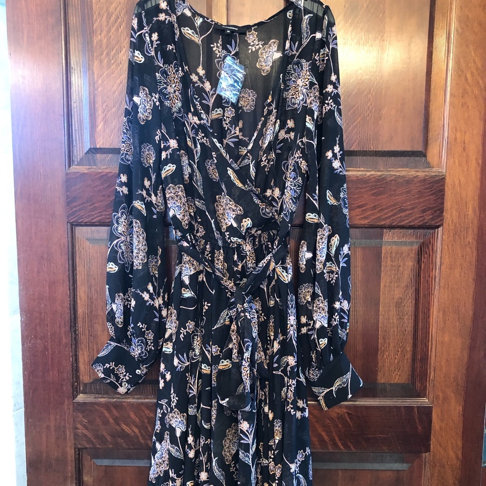 Long sleeved black maxi dress with side slits
